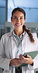 Research, face and happy woman in lab with tablet, science and pride for medical innovation. Mature scientist, laugh and tech in workplace for pharmaceutical development, forensic career and about us