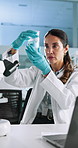 Science, liquid and woman with beaker and microscope for research, medical analysis and chemistry in lab. Healthcare, biotechnology and scientist with solution for sample, experiment and development