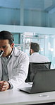 Scientist, man and microscope with clipboard in laboratory for medical research, test results and experiment innovation. Laptop, science and employee with checklist for pharmaceutical study or report