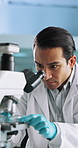 Science, laboratory and man with sample and microscope for research, medical analysis and chemistry. Healthcare, biotechnology and scientist with solution for medicine, experiment or forensic data
