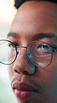 Man, glasses and computer in office for programming, software development and problem solving. Reflection, programmer and face in agency for cybersecurity, coding update and thinking with technology
