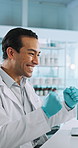 Science, success and man on laptop in lab for research, medical analysis and breakthrough. Healthcare, pharmaceutical and scientist on computer celebrate for cure, vaccine or medicine development