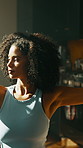 Warrior pose, yoga and woman in home for fitness, balance and calm with stretching in kitchen. Health, wellness and African yogi person for workout, exercise and holistic self care in apartment