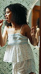 Energy, brushing teeth and woman in bathroom dancing to music, playlist or radio for dental health. Happy, hygiene and person with toothbrush for fun performance with oral care routine in home.