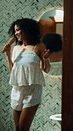Singing, brush and woman in bathroom dancing to music, playlist or radio for getting ready. Happy, energy and female person with hair tool for karaoke performance for fun with grooming in home.