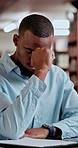 Frustrated man, student or paper with stress at library for project, assessment or university assignment. Male person, academic learner or anxiety with difficult essay, thesis or examination for test
