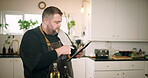 Home, man and chef with tablet for cooking, digital recipe and connection for food application. Kitchen, male person and cook with technology for culinary tips, instructions and ingredients for meal