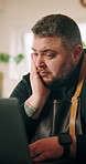 Stress, man and chef with laptop in house for cooking with recipe on mobile food application. Kitchen, technology and male culinary artist with research on tips, instructions and ingredients.