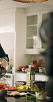 Camera, live streaming and man for cooking tutorial, dinner cuisine and meal prep in home kitchen. Culinary influencer, content creator and chef with food, recipe and ingredients for social media
