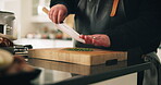 Cooking, hands and knife with person in kitchen of home for preparation of meal or supper. Cutting, food and ingredients with chef at counter in apartment for diet, health or nutrition closeup