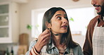 Woman, cooking and taste food in kitchen with meal preparation, helping and nutrition lunch. Couple, chef and teaching recipe with healthy ingredients, gourmet cuisine and bonding together at house