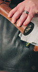 Person, hands and chef with seasoning on plate for gourmet dish, cuisine or serving in kitchen. Closeup, meal or adding spice with flavor, garnish or food for fine dining, hospitality or culinary art