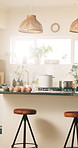 Empty room, kitchen and home with cooking, pot and onion with ingredients, steam or utensils for food. Countertop, container and stool with equipment for cuisine, meal prep and interior at apartment