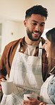 Morning, coffee and couple in home kitchen with conversation, cup and mug with drink. Smile, communication and love of people with laugh, house and marriage talking for breakfast plan with tea