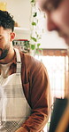 People, cooking class and learning in kitchen, conversation and help with skills development. Group, employee and teacher with student, apron and discussion with healthy food, advice and catering