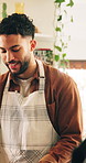 People, cooking class and learning in kitchen, conversation and help with skills development. Group, employee and teacher with student, apron and discussion with healthy food, advice and catering