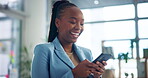 Business, employee and woman with smartphone, laughing and funny joke on company reviews and typing. Office, social media coordinator and happy with comments on website, online and person with smile