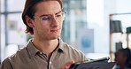 Business, tablet and man in office, glasses and creative with project, ideas or website info. Person, employee or web designer with tech, eyewear or communication with online schedule for digital app