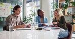 Planning, creative meeting and business people with documents for proposal, project and research. Startup, professional and men and women with paperwork for marketing, advertising and brand strategy