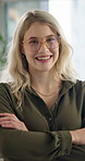 Crossed arms, happy and face of businesswoman in office with confidence for corporate career growth. Smile, professional and portrait of female financial analyst from London with pride in workplace.