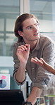 Business people, meeting and brainstorming with tablet in project discussion, review or collaboration at office. Group of employees, teamwork and talking on technology for schedule or planning tasks