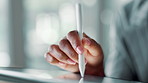 Person, hands and writing with tablet pen for digital drawing, sketch or interactive display at office. Closeup, user or graphic designer with technology for online app, UI design or UX at workplace