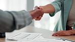 Business people, meeting and documents with handshake for signature, contract or agreement at office. Accountant, financial advisor or shaking hands with client for legal deal, loan or settlement