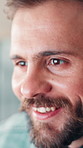 Creative, information and smile with business man in office for design or web development. Computer, programming and reading with happy designer in workplace for review of code, language or script