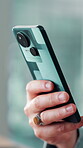 App, hands and phone with business person in office for communication or social media. Networking, search and text message with employee scrolling or typing on mobile for workplace connectivity