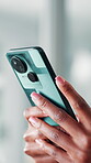 Hands, phone and reading with business person in office for communication or social media. App, information and text message with employee scrolling or typing on mobile for workplace connectivity