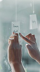 Glass wall, hands and sticky notes with business person in office for brainstorming or strategy. Ideas, mind map and primary target with employee at work for creative development. design or planning