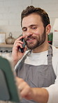 Cafe, phone call and man with tablet in startup for inventory update, restaurant stock order and small business. Hospitality, startup or store manager talking for planning menu, coffee shop or sales
