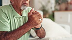 Senior man, hands and nervous with depression, nursing home or mental health with retirement and anxiety. Elderly person, living room or pensioner with regret, memory or sad with nostalgia or loss