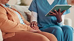 Nurse, woman and holding hands for comfort with tablet for bad news, cancer diagnosis and medical results. Elderly person, caregiver and digital with support, healthcare report and treatment at house