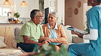 Senior, couple and checkup with caregiver on tablet for good news, medical results and advice. People, nurse and talk with digital for healthcare information, diagnosis and explain treatment at house