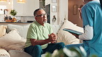 Nursing home, old man and listening to nurse, tablet and woman with health assessment, info and online. Communication, elderly patient and caregiver with medical report, people or tech for healthcare