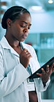 Thinking, science and black woman with tablet, research or online schedule for experiment. African person, chemistry expert or scientist in lab, tech or decision for test report or review with choice