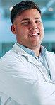 Scientist, arms crossed and face of man in laboratory for pharmaceutical, biotech or medical research. Healthcare, portrait and proud scientist with confidence, smile or professional in lab study