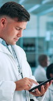 Scientist, tablet and man typing in laboratory for pharmaceutical, biotech or medical research. Healthcare, online and biologist person with report, smile or professional breakthrough in lab study