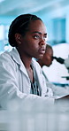 Science, research and woman in lab, online reading and thinking with deadline for experiment results. Person, employee and scientist in workplace, vaccine development and medical test for cure
