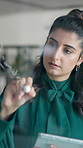 Woman, tablet and writing by glass, office and mind map with notes, planning and problem solving at startup. Person, digital touchscreen and app by board with link, solution and project management