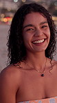 Girl, face and happy at beach, sunset and laugh with confidence, pride and outdoor on holiday in summer. Person, woman and excited in portrait with smile at dusk, vacation and getaway in Costa Rica