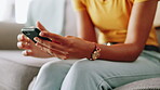 Hands, woman and typing with phone on sofa for dating site chat, social media post and text message response. Closeup, person and smartphone for internet research, email notification or communication