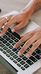 Hands, business and woman with laptop, keyboard and typing with cyber security upgrade. Closeup, person and programmer in workplace, computer and hacking with developer, coding and building software