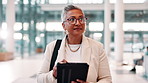 Mature, tablet and business woman walk in office for investment banking, finance solution and reading email. Idea, digital technology and manager with vision for profit, economy news and planning