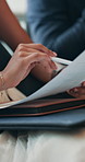 Document, reading and hands of person at interview for resume application, documents and hiring checklist. Paperwork, meeting and survey with closeup of applicant in lobby for job search and vacancy
