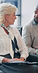 Business, people and talk for interview in waiting room with resume, recruitment process and survey advice. Woman, man and discussion with cv for corporate hiring, faq application and job opportunity