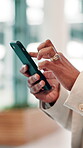 Business, hands or person in office with mobile or online research for economy website or finance report. Schedule, check or financial advisor with smartphone app for text message, closeup or update
