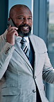 African businessman, phone call and smile at office with contact, deal and market update at trading company. Mature person, smartphone and financial advisor with consultation at investment agency