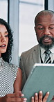 Business, people and talk with tablet in office for reading email, financial report and management. Woman, man and discussion with digital for schedule update, budget planning and investment feedback